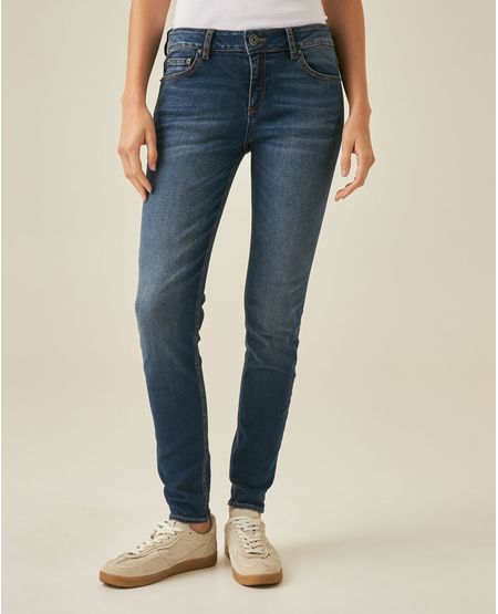 Jean de Mujer Skinny Fit Tiro Bajo con Bigotes Visibles Lavado Oscuro en Mezcla Eco-Consciente